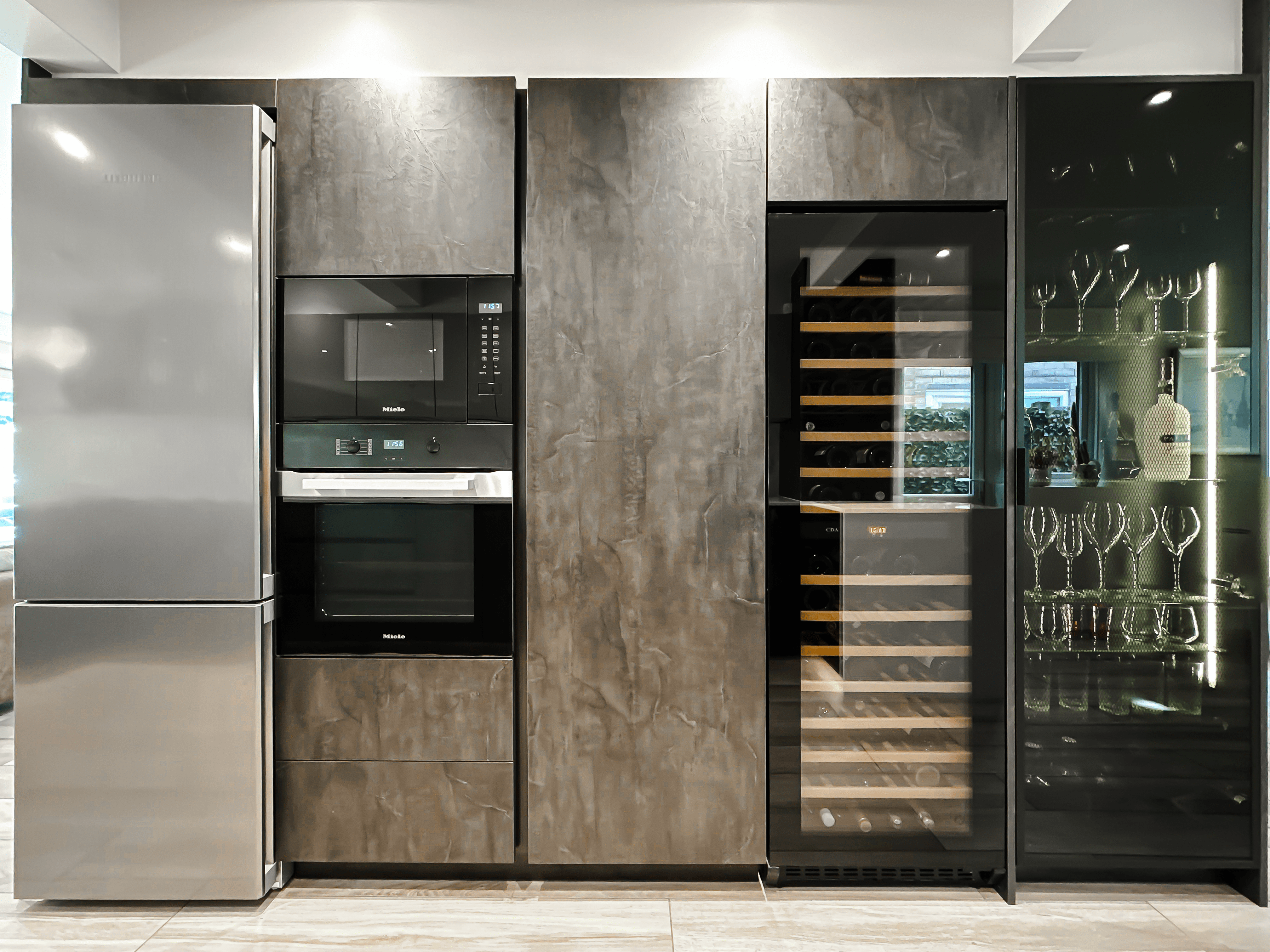 Image of kitchen appliances including combi oven and wine cooler